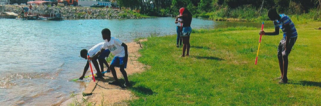 group of people cleaning